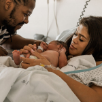 couple and their newborn